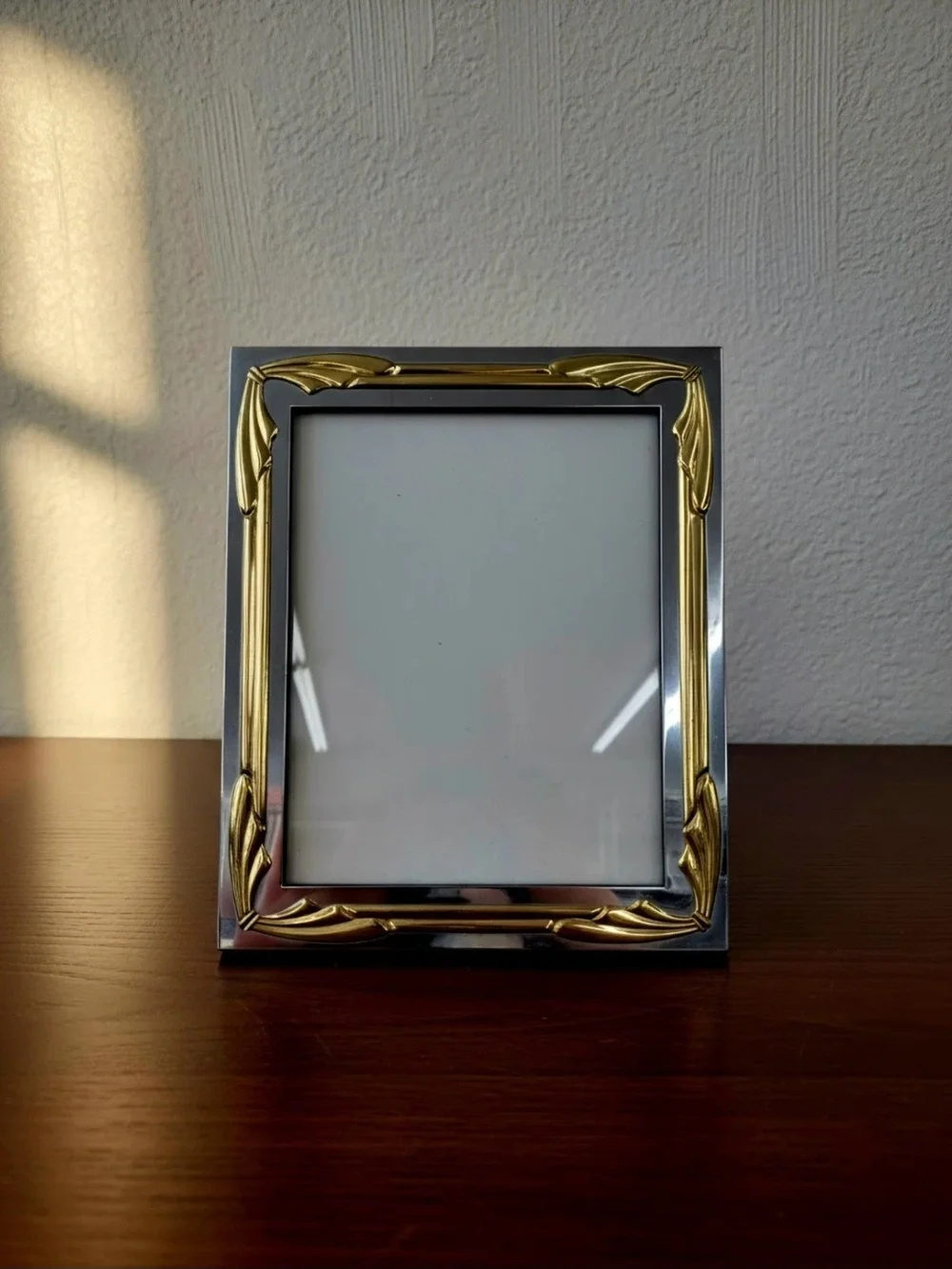 Mid Century Picture Frame Featuring Silver Mirroed Finish With Ornate Gold Tones